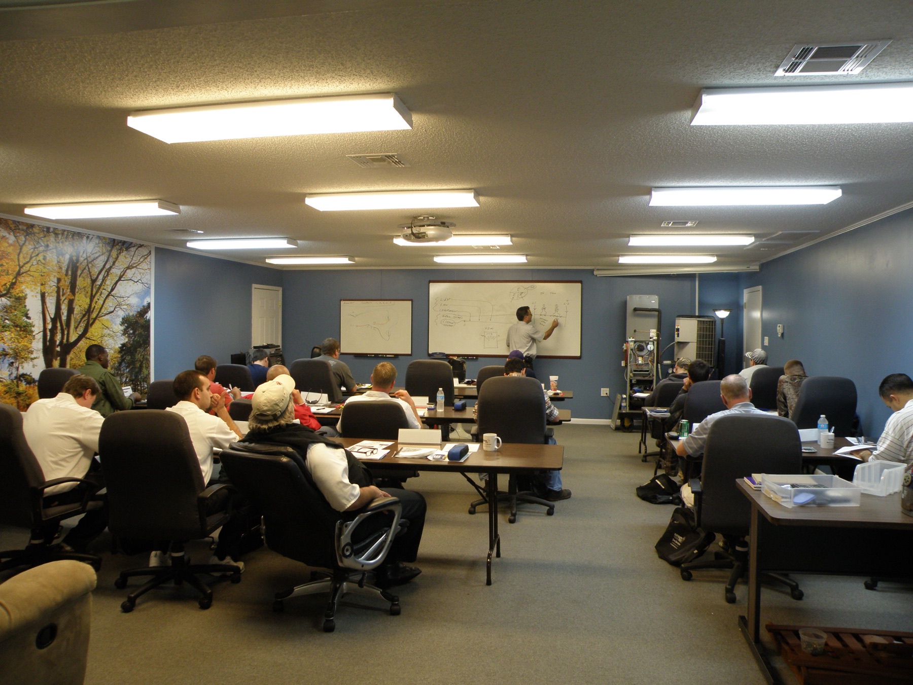 Mark Hardwick teaching a class at the UTA training facility